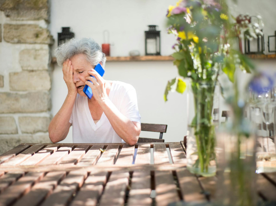 senior on phone